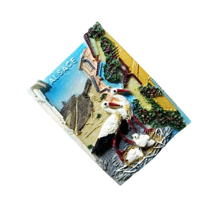 alsace france fridge magnet – storks in village scene travel souvenir & traditional countryside decor